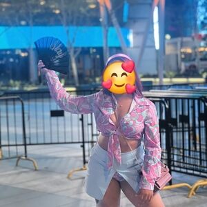 Dolls Kill Sugar Thrillz swinging scene tie top and mini skort